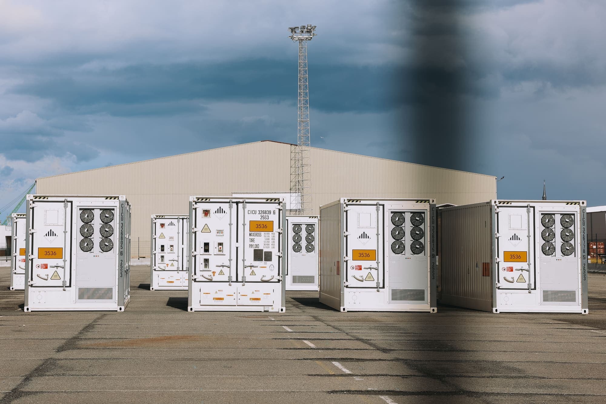 Battery energy storage system containers staged at a logistics yard