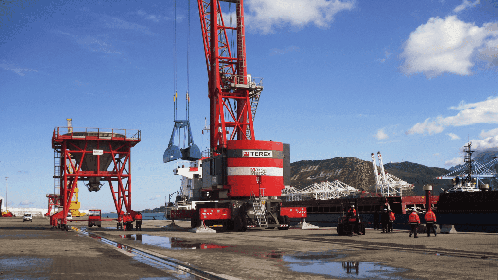 A Terex mobile harbour crane and dockworkers at a Marsa Maroc port terminal in Morocco